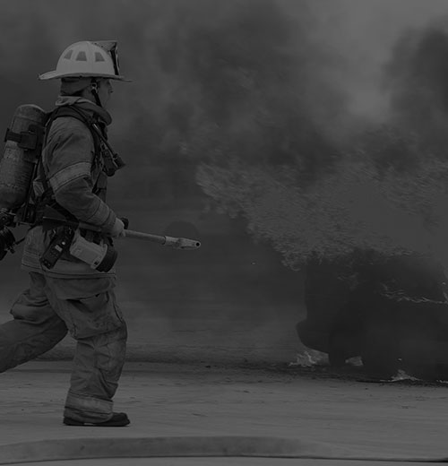 fire fighter and flames